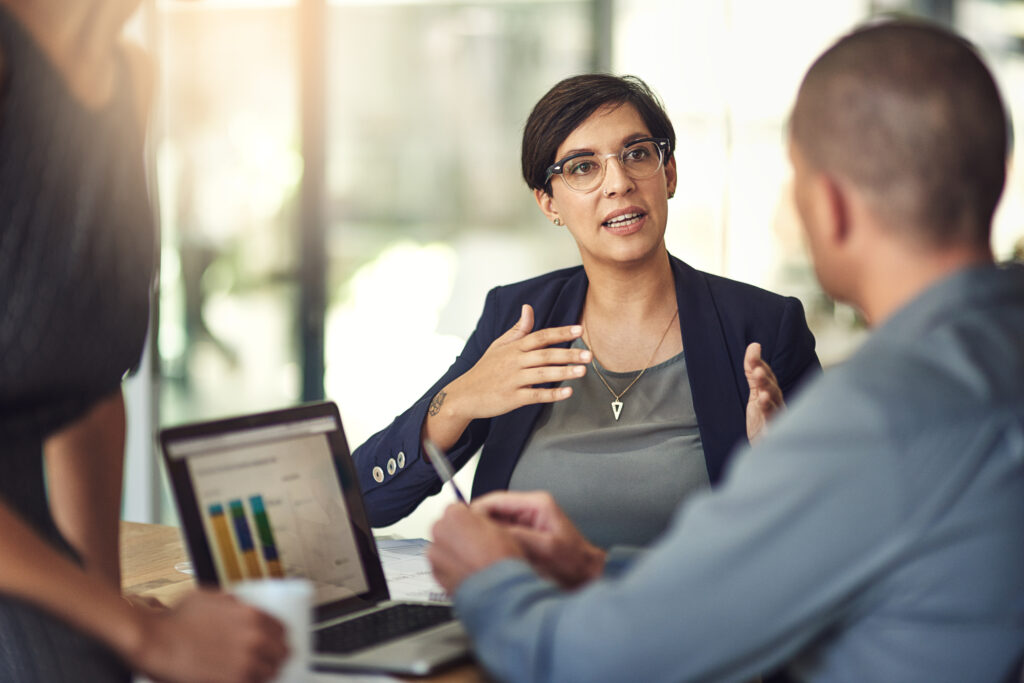 Tax agent having a meeting with a client in an office.