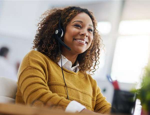 A professional with a headset in an office