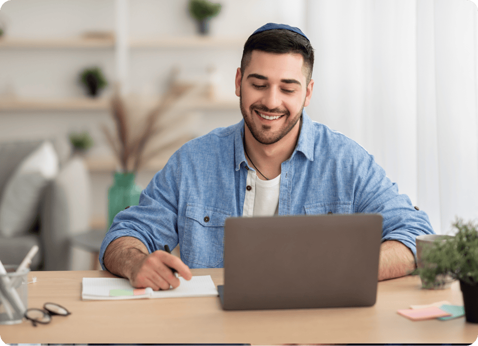 An IT consultant with a laptop at his work.